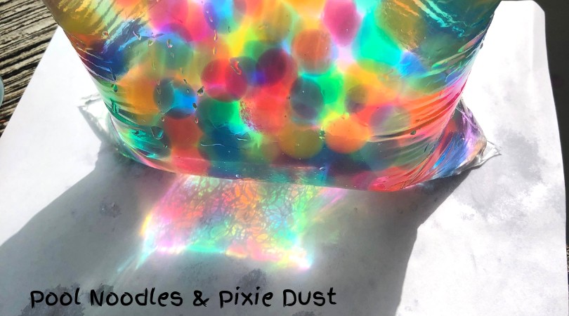 Investigating Colors with a Rainbow Water Beads Science Sensory Bin - Pool Noodles & Pixie Dust